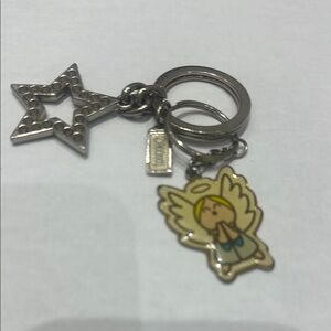 100% authentic Coach Silver Star key chain and Angel Key Holder